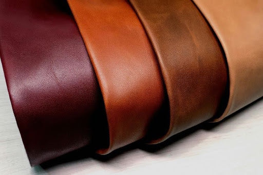 Leather samples in different shades of brown and burgundy.