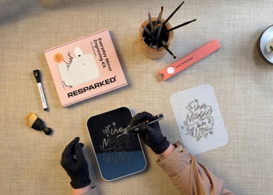 Person using an engraving kit at home.
