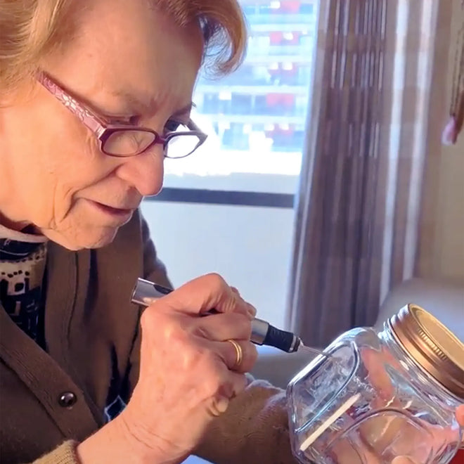 A crafter using the Customizer engraving pen with ease